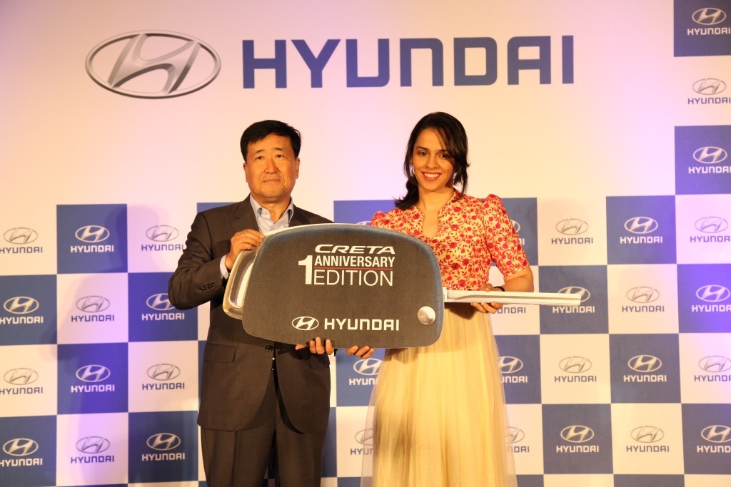 Mr. Y K Koo, Managing Director and CEO, Hyundai Motor India Ltd. presenting Hyundai Creta 1st Anniversarry