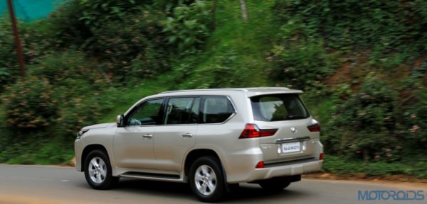 Lexus LX 450d - rear side view - action shot