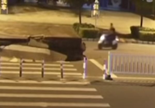 Rider drops into sinkhole China