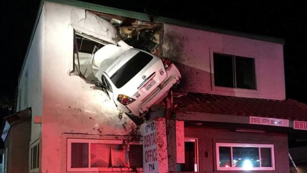 Driver high on drugs crashes into building