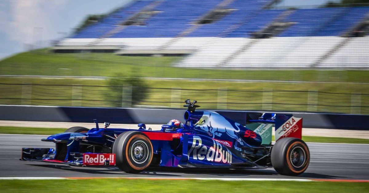 MotoGP Champion Marc Marquez Trades His RCV For A Scuderia Toro Rosso F Car Feature Image