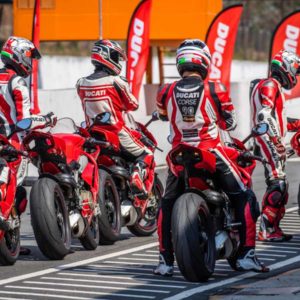 Ducati DRE trainer bikes lined up rear