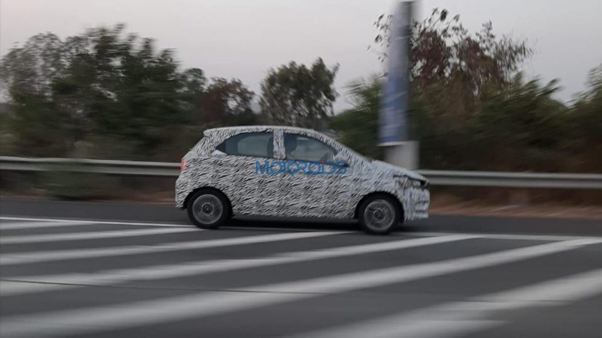 Tata Tiago facelift spied side profile rolling