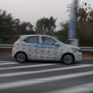 Tata Tiago facelift spied side profile rolling