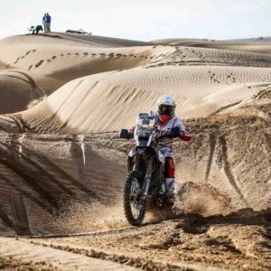 Joaquim Rodrigues riding through dunes