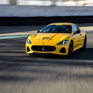 Maserati yellow GT on track