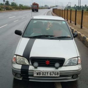 kmph Maruti Esteem front on road