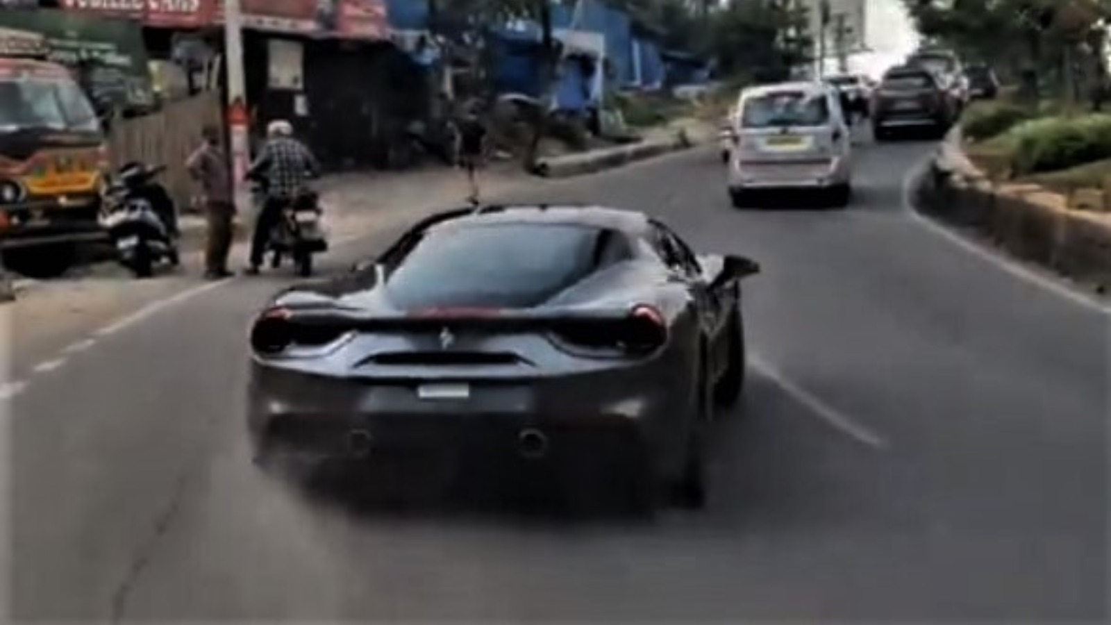 A Sideways Ferrari 488 Nearly Takes Out Two Innocent