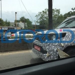 BS Mahindra TUV Plus Spied side front