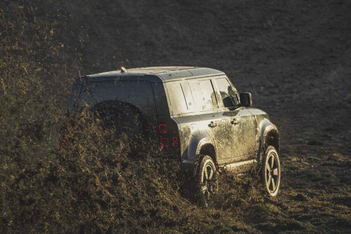 Behind the scenes image of the New Land Rover Defender featured in No Time To Die