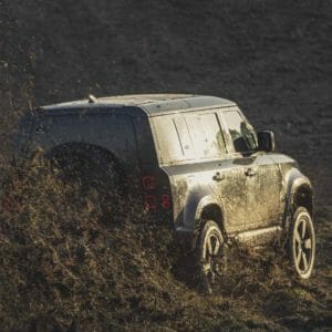 Behind the scenes image of the New Land Rover Defender featured in No Time To Die