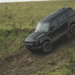 Behind the scenes image of the New Land Rover Defender featured in No Time To Die