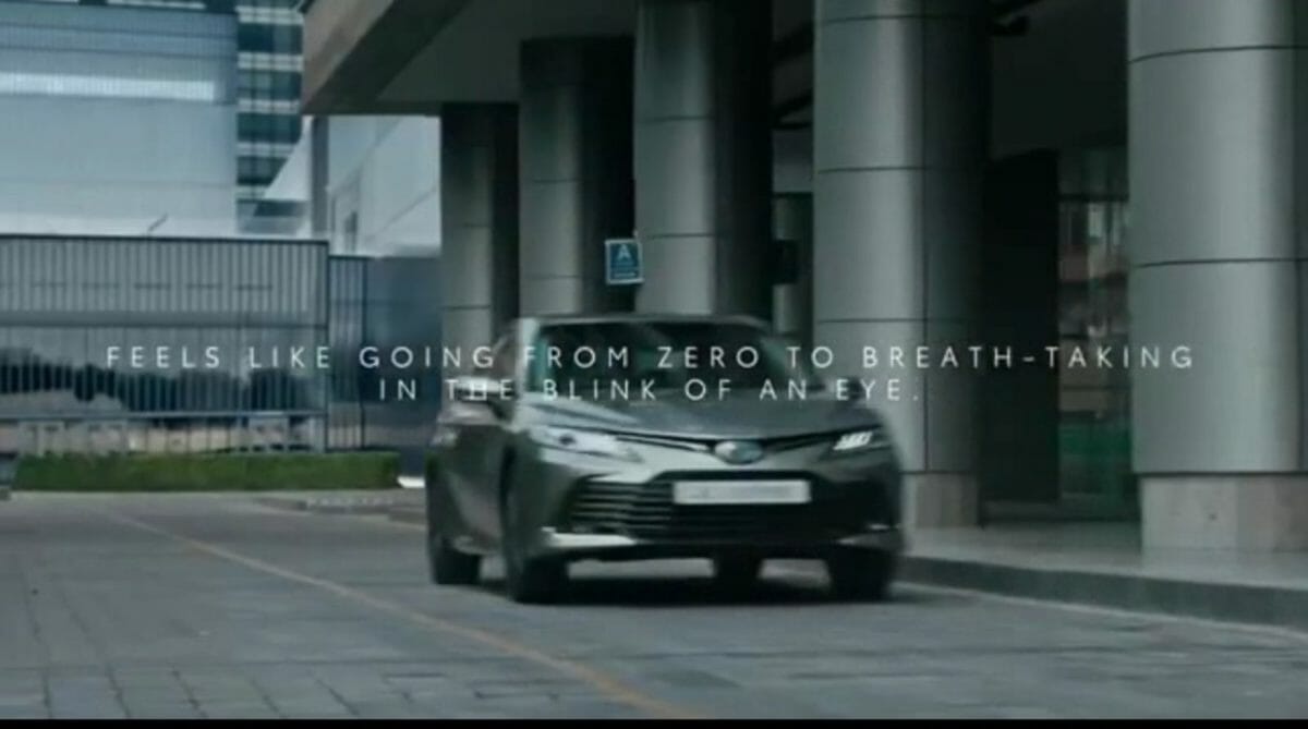 toyota camry hybrid teased 2022